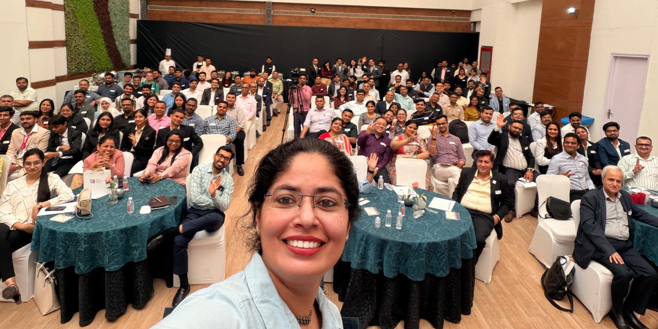 Shalu Manan with an engaged conference audience