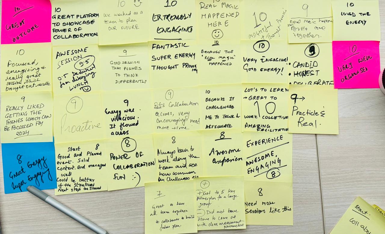 Handwritten participant sticky notes highlighting collaboration, energy, and 10 out of 10 ratings